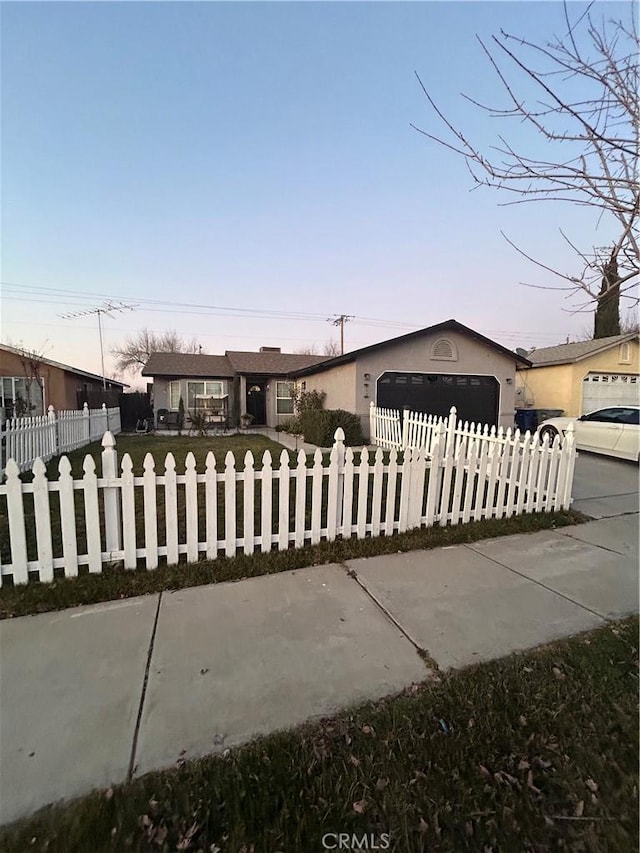 view of front of home featuring a garage