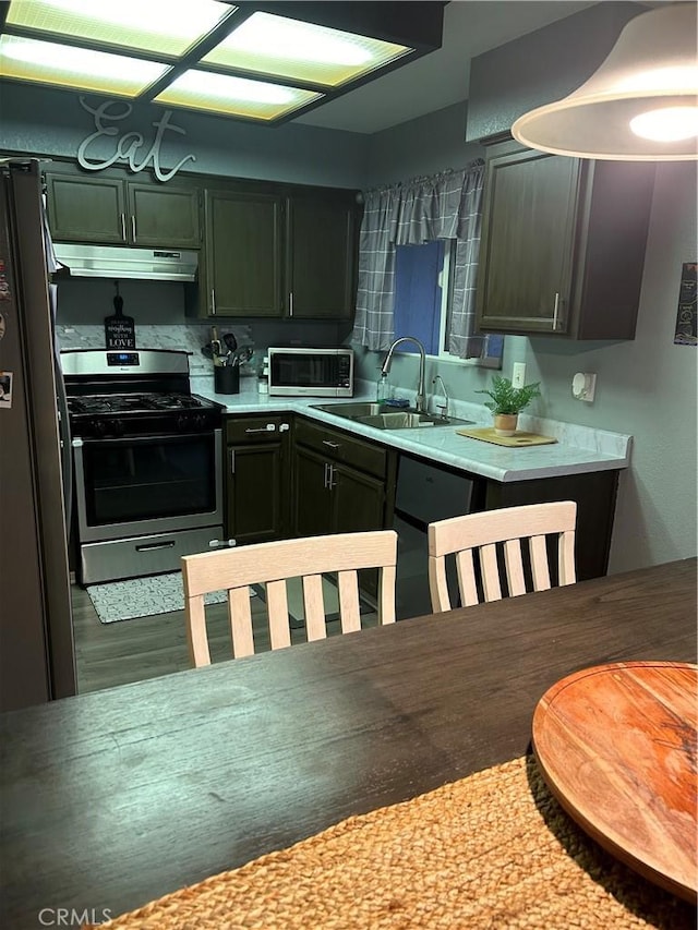 kitchen with sink and stainless steel appliances