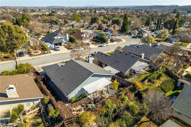 birds eye view of property with a residential view