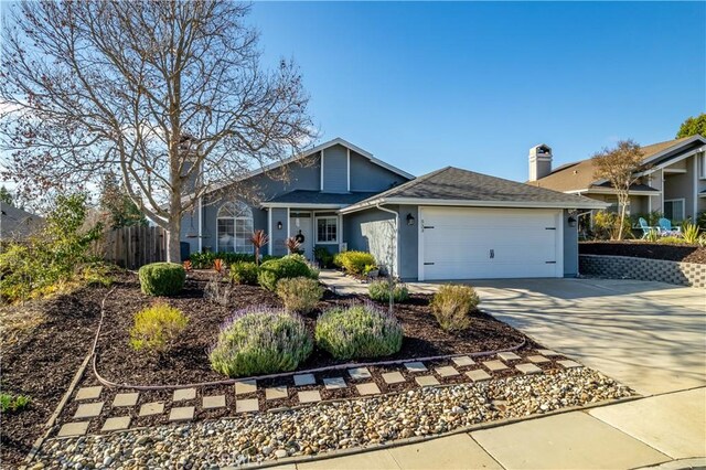 ranch-style home with a garage