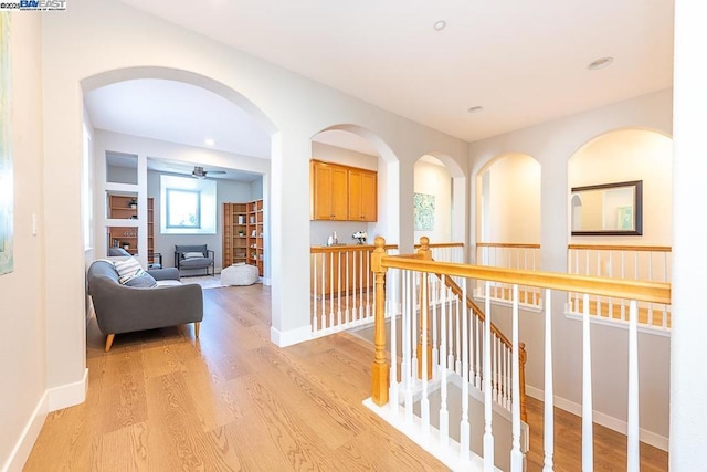 hall with light hardwood / wood-style flooring