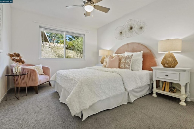 bedroom with vaulted ceiling, ceiling fan, and carpet