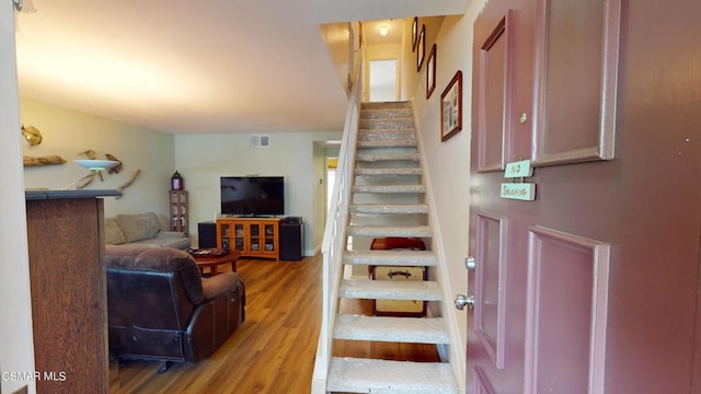 interior space with hardwood / wood-style flooring