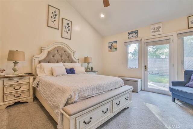 carpeted bedroom with vaulted ceiling, access to exterior, and ceiling fan