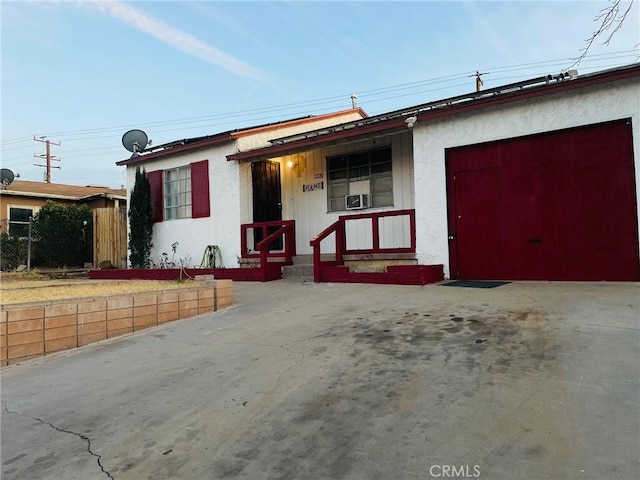 ranch-style home with a garage