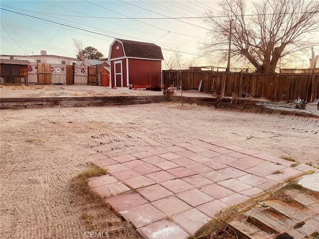 view of patio / terrace with a storage shed