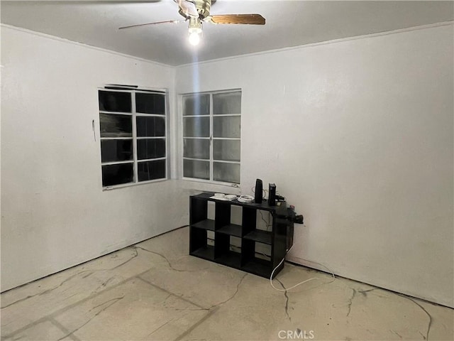 unfurnished room featuring ceiling fan