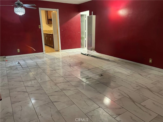 empty room featuring ceiling fan