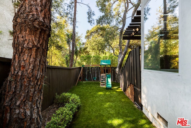 view of yard with a playground