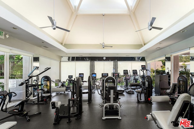 workout area with high vaulted ceiling and ceiling fan