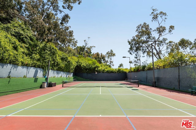 view of tennis court with basketball court