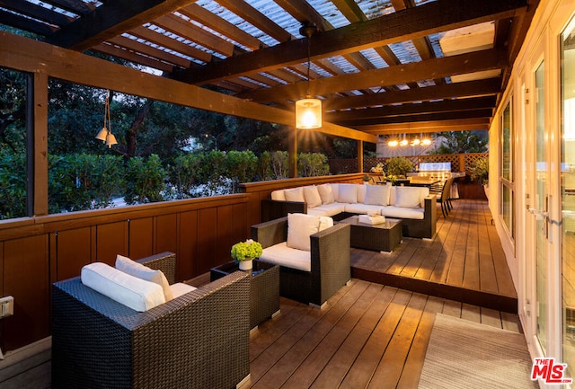 wooden terrace with an outdoor living space and a pergola