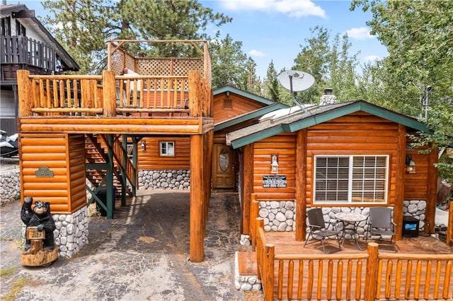 view of jungle gym featuring a wooden deck