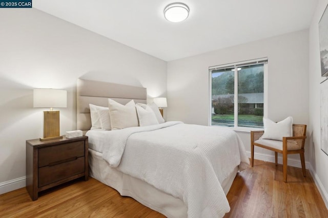 bedroom featuring hardwood / wood-style floors