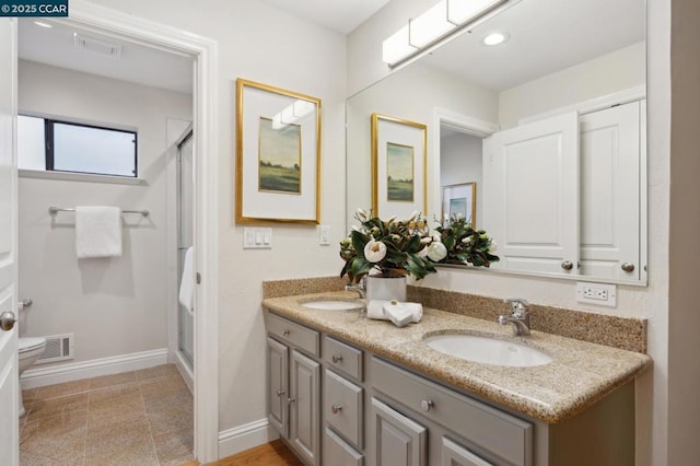 bathroom featuring vanity and walk in shower