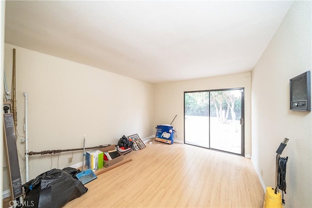 miscellaneous room with hardwood / wood-style floors