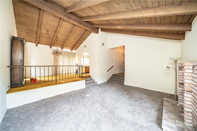 unfurnished living room featuring beam ceiling, dark colored carpet, high vaulted ceiling, and wood ceiling