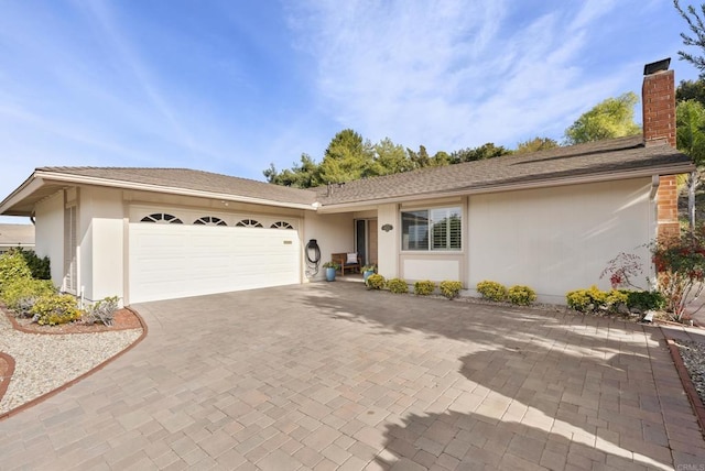 single story home with a garage