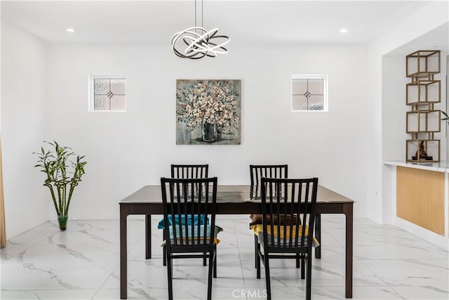 dining area featuring a chandelier