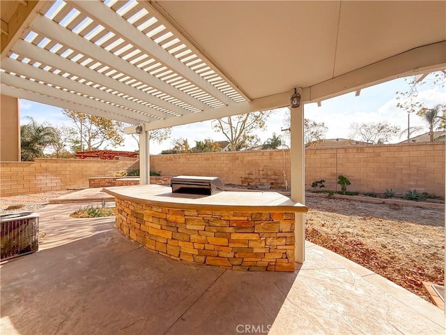 view of patio / terrace with an outdoor kitchen, area for grilling, central air condition unit, and a pergola