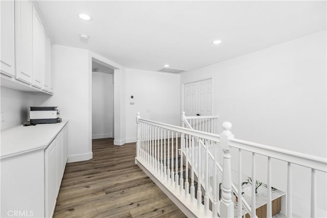 corridor featuring hardwood / wood-style flooring