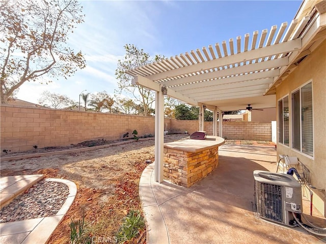 view of patio / terrace with central AC unit and a pergola