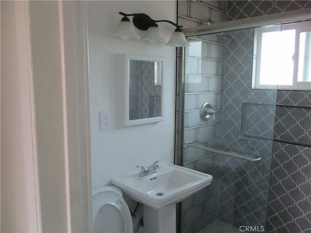 bathroom with toilet and sink