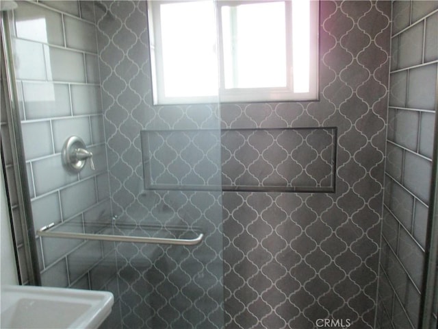 bathroom featuring walk in shower