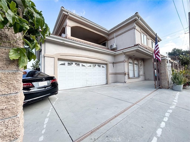 front of property with a garage