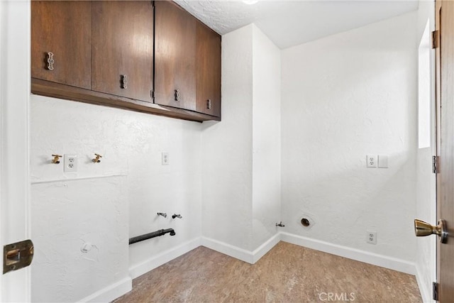 laundry room with cabinets, washer hookup, and hookup for a gas dryer