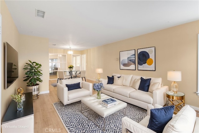 living room featuring light wood-type flooring