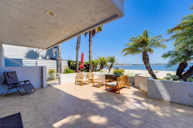 view of patio / terrace featuring a water view