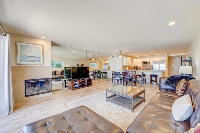 living room featuring ceiling fan