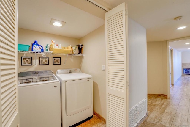 washroom featuring separate washer and dryer