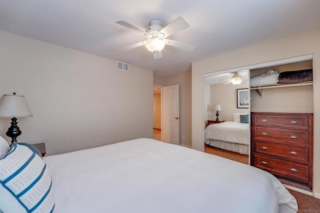 carpeted bedroom with a closet and ceiling fan