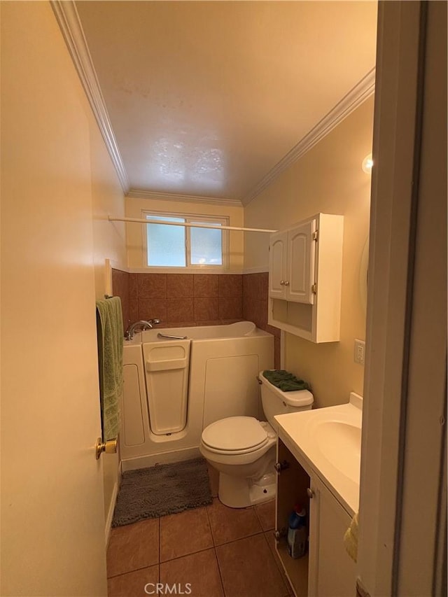 full bathroom featuring vanity, ornamental molding, tile patterned floors, and toilet