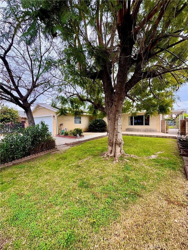 view of yard with a garage