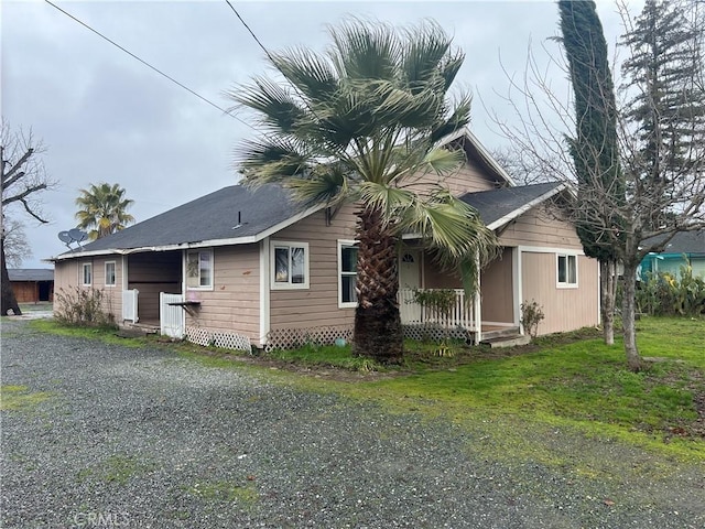 view of property exterior featuring a yard