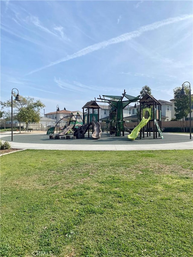 view of playground featuring a yard