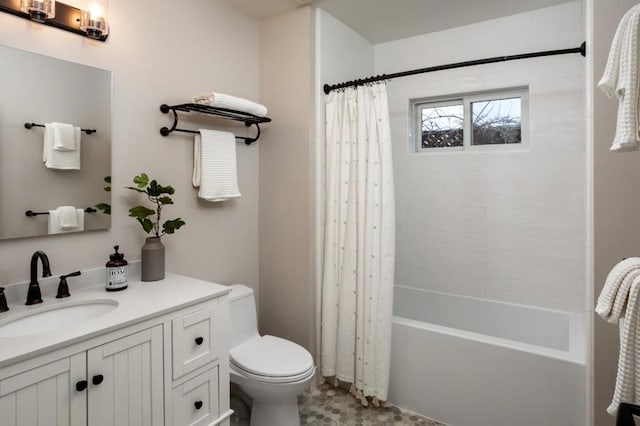 full bathroom featuring vanity, toilet, and shower / bath combo