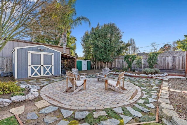 view of patio featuring a storage unit