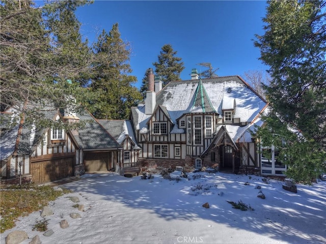 29223 Pigeon Hawk Ln, Lake Arrowhead, CA 92352 - snow covered rear of property featuring a garage
