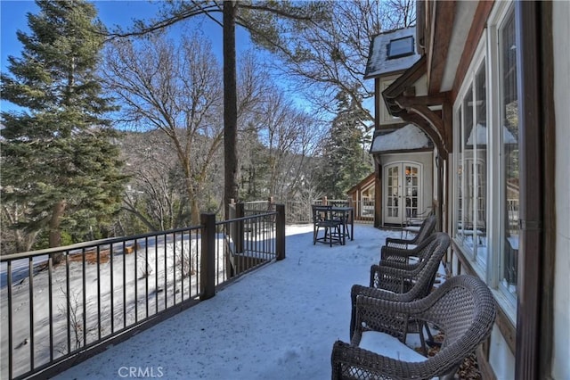 29223 Pigeon Hawk Ln, Lake Arrowhead, CA 92352 - snow covered patio with french doors and a balcony