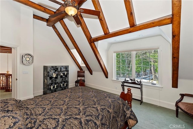 carpeted bedroom with lofted ceiling with beams