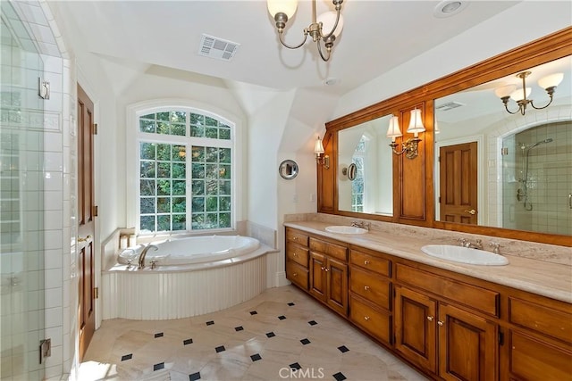 29223 Pigeon Hawk Ln, Lake Arrowhead, CA 92352 - full bathroom featuring a chandelier, a shower stall, double vanity, and plenty of natural light