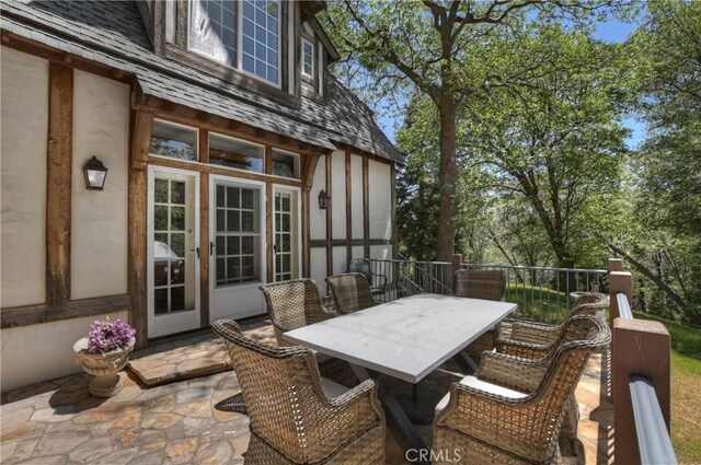 29223 Pigeon Hawk Ln, Lake Arrowhead, CA 92352 - view of patio / terrace with outdoor dining space and french doors