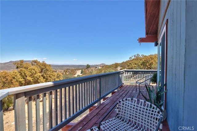 deck featuring a mountain view