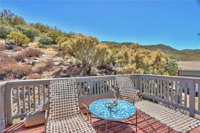 deck featuring a mountain view