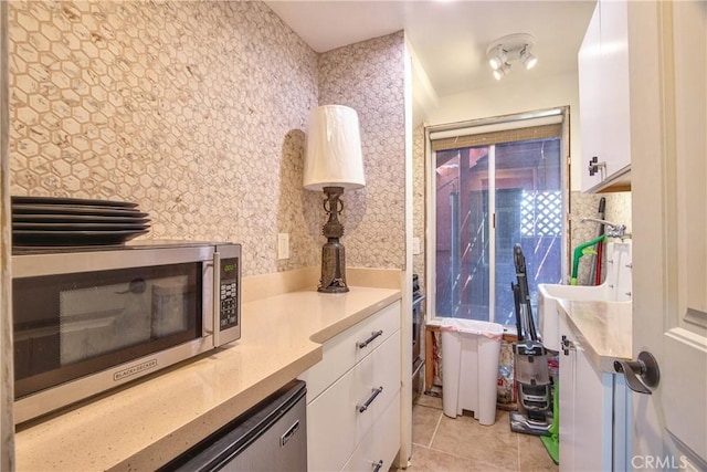 bathroom with tile patterned flooring