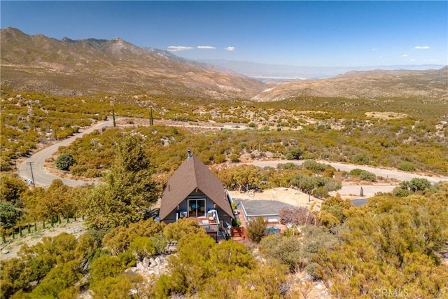 drone / aerial view featuring a mountain view